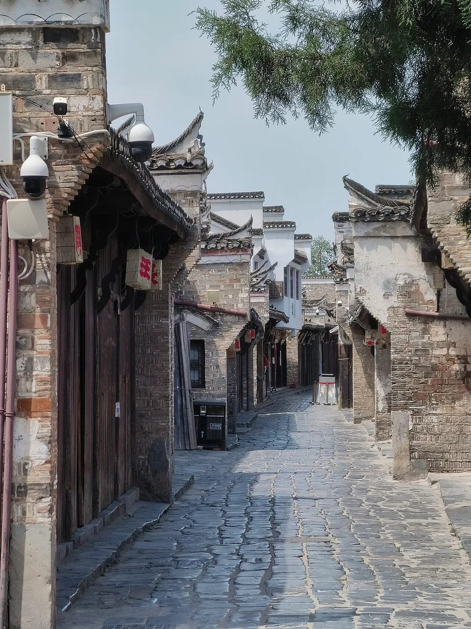 Historic buildings and a walking lane in Sanhe Ancient Town near Hefei.