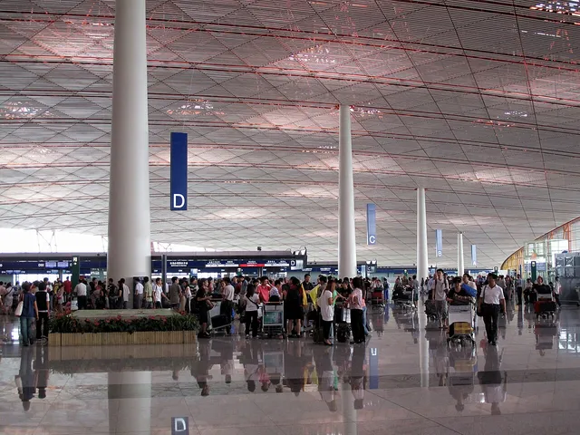 The interior of Beijing Capital International Airport, Terminal 3, photographed in 2009. A setting photograph for your arrival preparations.