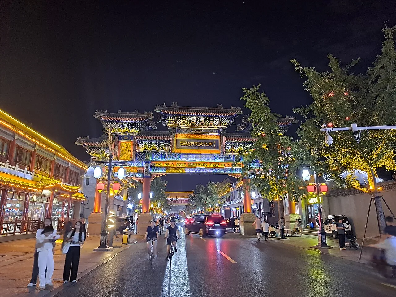 Illuminated historic buildings in Zhengding Ancient City at night.