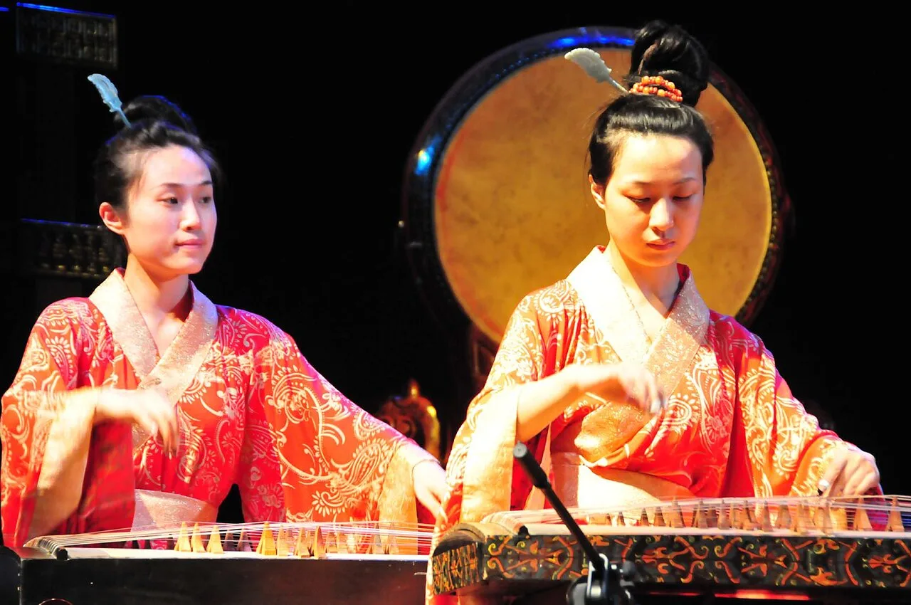 Musicians performing with traditional Chinese instruments at Henan Museum.