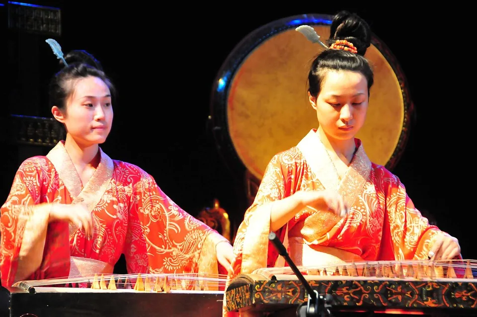 Musicians performing with traditional Chinese instruments at Henan Museum.